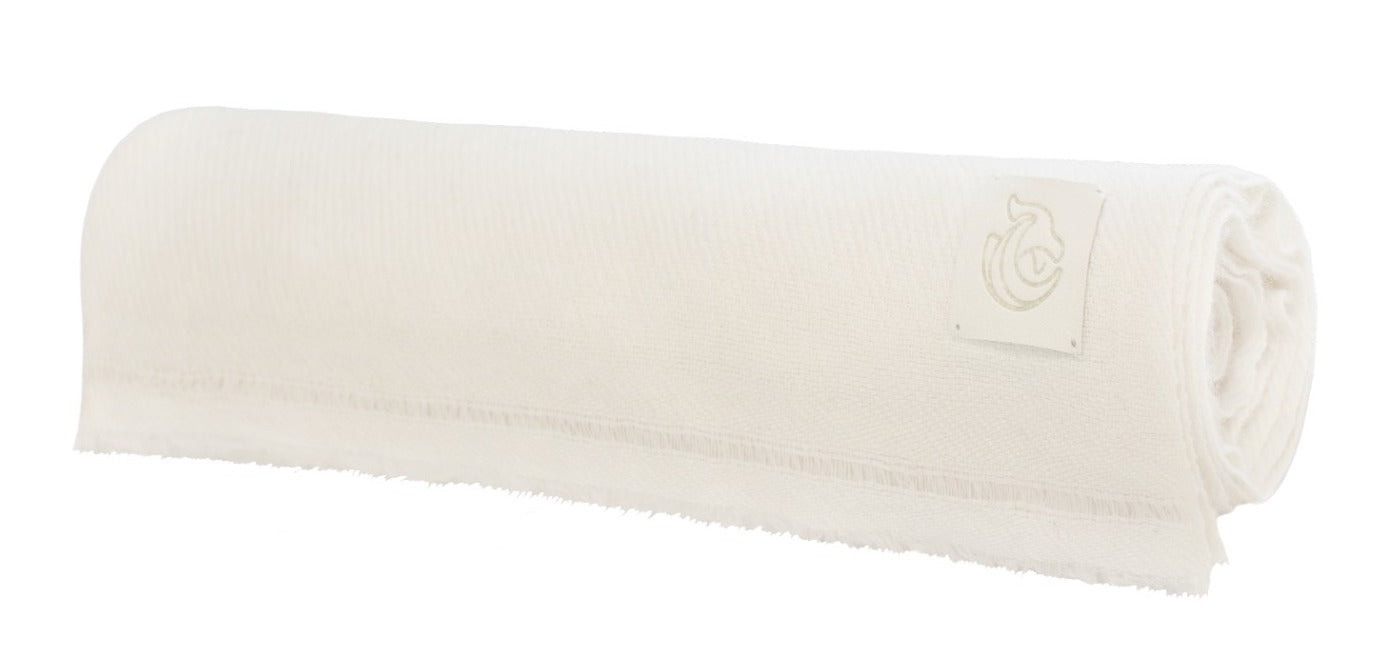 A woven cashmere shawl natural white